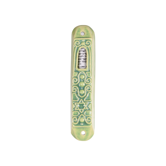 Green ceramic mezuzah with ornamental swirl and Star of David motifs, featuring a white scroll visible in a central window. - Light brown glazed - Prague Judaica