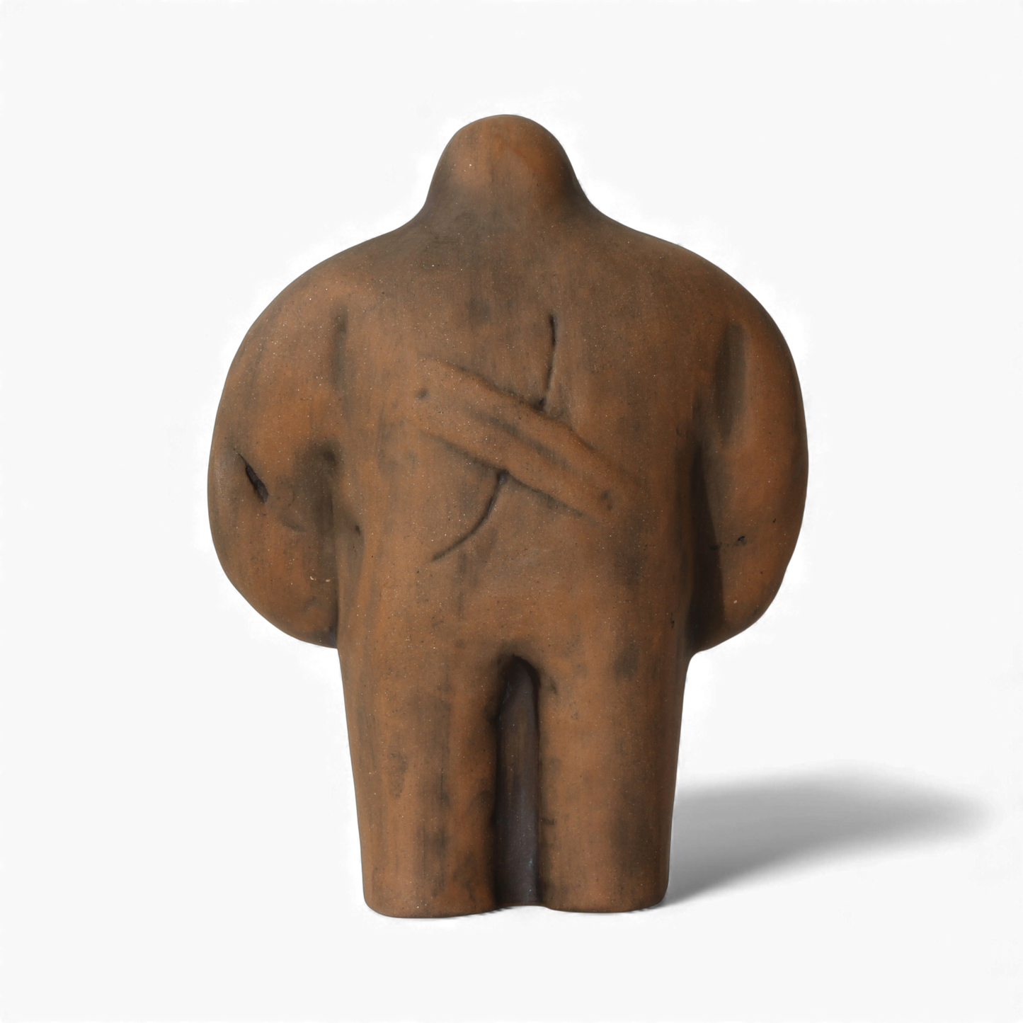 Large matte brown clay sculpture of a humanoid figure with simplified, rounded features and crossed marks on its chest,. - Default Title - Prague Judaica