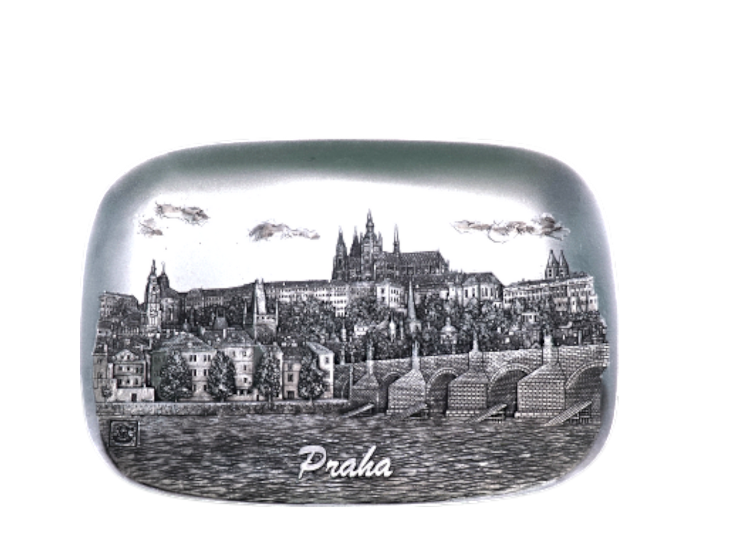 Rectangular ceramic tile featuring a detailed black and white relief of Prague Castle and Charles Bridge under a cloudy sky, - Daily - Prague Judaica